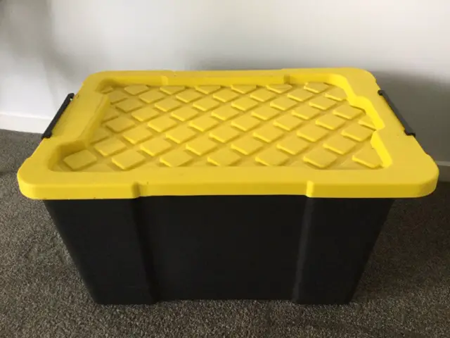 Large plastic tub used for storing beehive frames